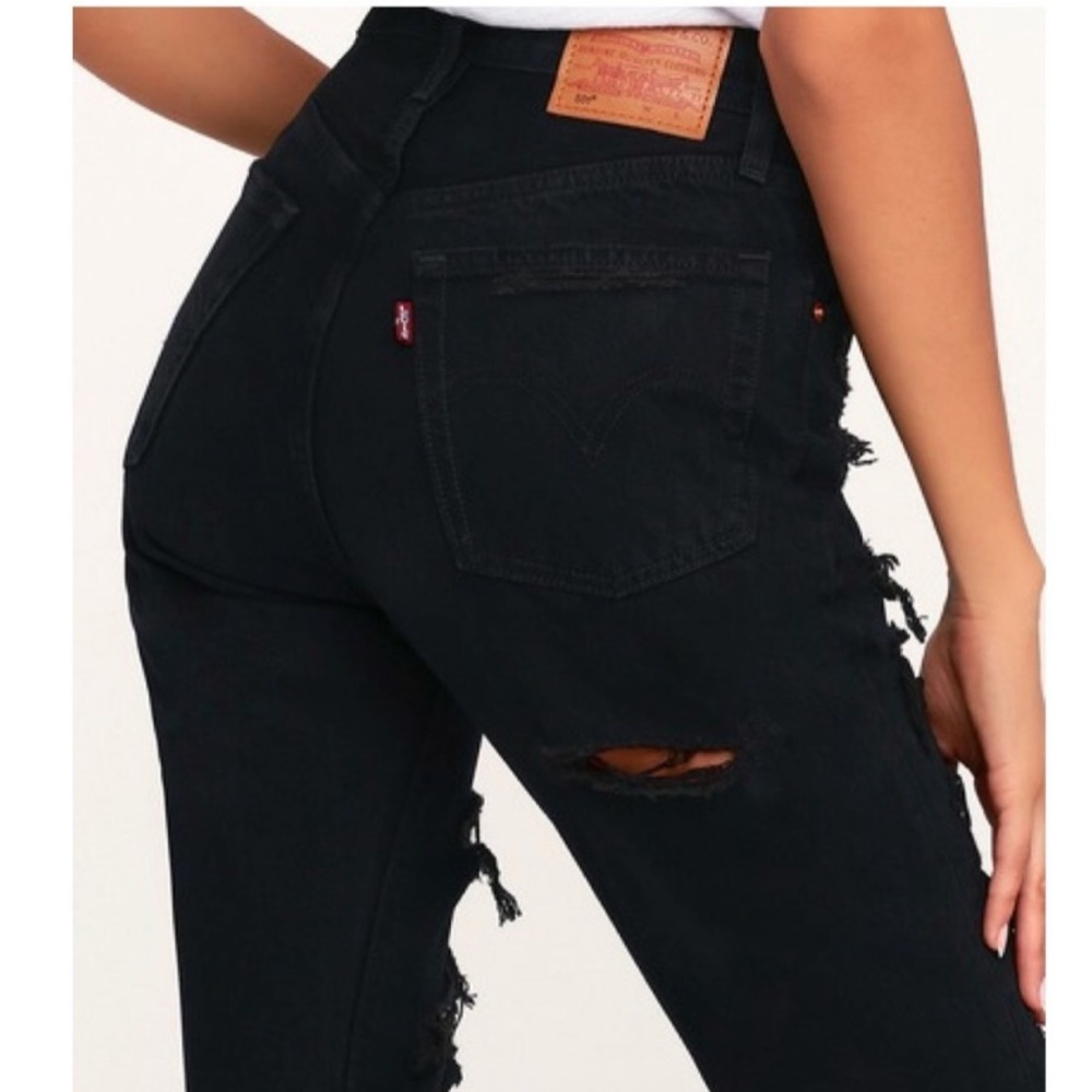 Levi’s. 501 distressed black jeans
